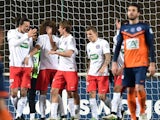 Paris Saint-Germain's players celebrate after scoring a goal during the French Cup football match Montpellier vs PSG, on January 5, 2015