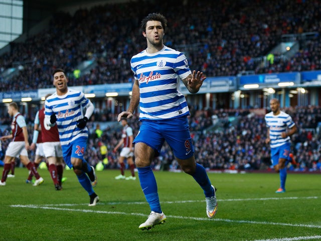 Charlie Austin of QPR celebrates scoring his penalty during the Barclays Premier League match between Burnley and Queens Park Rangers at Turf Moor on January 10, 2015