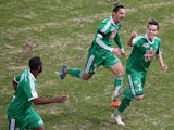Saint-Etienne's French midfielder Romain Hamouma celebrates after scoring a goal during the French L1 football match between Reims (RS) and Saint-Etienne (ASSE) on January 10, 2015