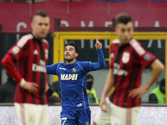 Nicola Sansone of Sassuolo celebrates the equalizing goal during the Serie A match between AC Milan and US Sassuolo Calcio at Stadio Giuseppe Meazza on January 6, 2015 