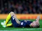 Toby Alderweireld of Southampton reacts after picking up an injury during the Barclays Premier League match between Manchester United and Southampton at Old Trafford on January 11, 2015