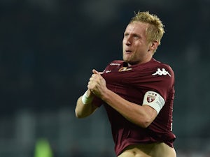 Torino earn draw against 10-man AC Milan