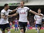 Tottenham Hotspur's English striker Harry Kane celebrates scoring the opening goal with Tottenham Hotspur's English defender Kyle Walker during the English Premier League football match between Crystal Palace and Tottenham Hotspur at Selhurst Park in sout