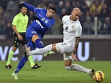 Alvaro Morata (L) of Juventus FC in action against Guillermo Daniel Rodriguez Perez of Hellas Verona FC during the TIM Cup match on January 15, 2015
