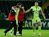 Ben Foden of Northampton Saints is taken off injured during the match with Ospreys on January 18, 2015