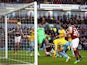 Ben Mee of Burnley heads in the opening goal during the Barclays Premier League match between Burnley and Crystal Palace at Turf Moor on January 17, 2015