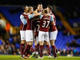 Ross Wallace of Burnley celebrates with team mates as he scores their second goal during the FA Cup Third Round Replay match between Tottenham Hotspur and Burnley at White Hart Lane on January 14, 2015