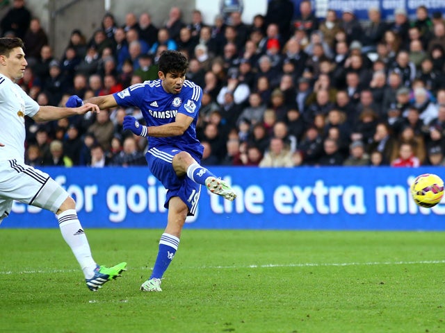 Diego Costa of Chelsea scores his team's second goal during the Barclays Premier League match between Swansea City and Chelsea at Liberty Stadium on January 17, 2015