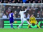 Chelsea player Oscar shoots to score the opening goal during the Barclays Premier League match between Swansea City and Chelsea at Liberty Stadium on January 17, 2015 