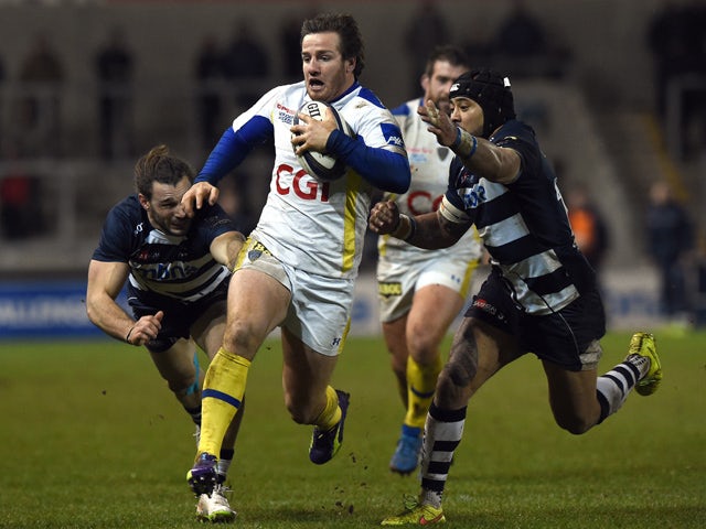 Clermont's French fly-half Camille Lopez makes a break during the European Rugby Champions Cup rugby union match between Sale Sharks and ASM Clermont Auvergne at AJ Bell Stadium in Eccles, west of Manchester on January 17, 2015