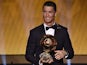 Real Madrid and Portugal forward Cristiano Ronaldo smiles after receiving the 2014 FIFA Ballon d'Or award for player of the year during the FIFA Ballon d'Or award ceremony on January 12, 2015