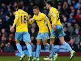 Dwight Gayle of Crystal Palace celebrates with team mates after scoring their first goal during the Barclays Premier League match between Burnley and Crystal Palace at Turf Moor on January 17, 2015