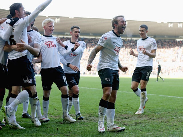 Johnny Russell of Derby celebrates after his corner was turned in for the first goal during the Sky Bet Championship Match between Derby County and Nottingham Forest at iPro Stadium on January 17, 2015