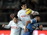  Francesco Tavano of Empoli FC battles for the ball with Gary Medel and Marco Andreolli of FC Internazionale during the Serie A match between Empoli FC and FC Internazionale Milano at Stadio Carlo Castellani on January 17, 2015