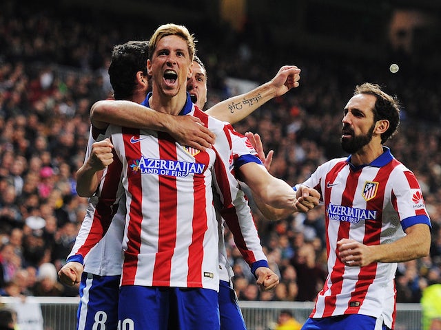 Fernando Torres of Atletico de Madrid celebrates after scoring Atletico's opening goal during the Copa del Rey Round of 16, Second leg match against Real Madrid on January 15, 2015