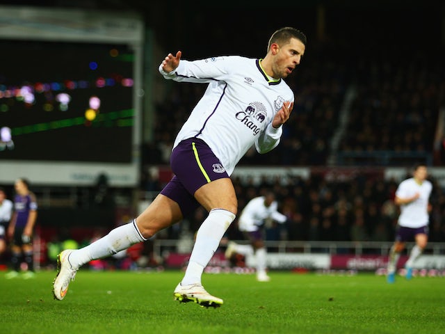 Kevin Mirallas of Everton celebrates as he scores their first and equalising goal from a free kick during the FA Cup Third Round Replay match against West Ham United on January 13, 2015