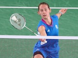 Kirsty Gilmour of Scotland plays a forehand as she competes in her women's singles badminton quarter-final match at Emirates Arena on August 1, 2014