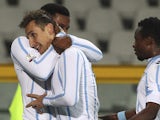 Miroslav Klose #11 of SS Lazio celebrates with his team-mate Balte Keita after scoring his goal during the TIM Cup match between Torino FC and SS Lazio at Stadio Olimpico di Torino on January 14, 2015