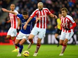 Anthony Knockaert of Leicester City battles for the ball with Marc Wilson of Stoke City during the Barclays Premier League match between Leicester City and Stoke City at The King Power Stadium on January 17, 2015