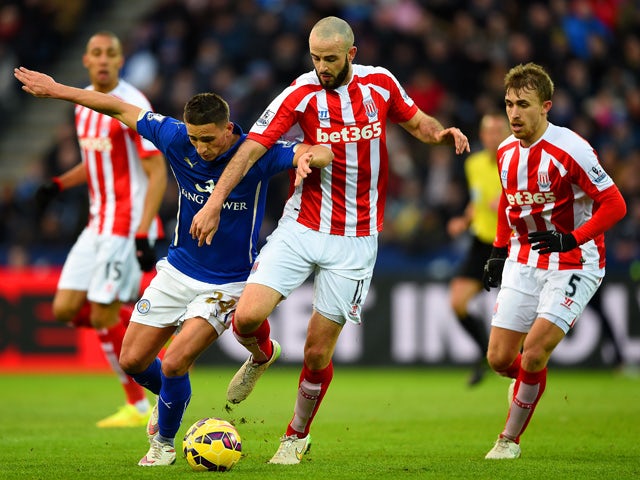 Anthony Knockaert of Leicester City battles for the ball with Marc Wilson of Stoke City during the Barclays Premier League match between Leicester City and Stoke City at The King Power Stadium on January 17, 2015