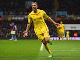 Rickie Lambert of Liverpool celebrates scoring their second goal during the Barclays Premier League match between Aston Villa and Liverpool at Villa Park on January 17, 2015