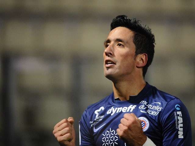 Montpellier's Paraguayan forward Lucas Barrios celebrates after scoring during the French L1 football match Metz vs Montpellier on January 17, 2015