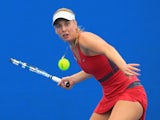 Naomi Broady of Great Britain plays a forehand in her qualifying match against Urszula Radwanska of Poland for the 2015 Australian Open on January 15, 2015