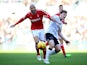 Kelvin Wilson of Nottingha m Forest (L) in action with Chris Martin of Derby during the Sky Bet Championship Match between Derby County and Nottingham Forest at iPro Stadium on January 17, 2015