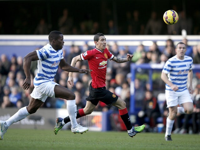 Manchester United's Argentinian midfielder Angel Di Maria and Queens Park Rangers' English defender Nedum Onuoha run after the ball during the English Premier League football match between Queens Park Rangers and Manchester United at Loftus Road Stadium i