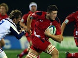 Rory Thornton of Wales makes a break during the 2014 Junior World Championship match between Wales and France at ECOLight Stadium, Pukekohe on June 15, 2014