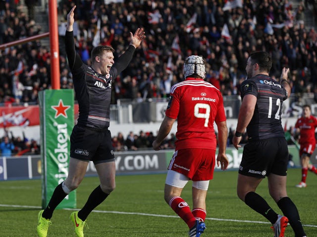 Chris Ashton of Saracens celebrates scoring a try during the European Rugby Champions Cup pool one match between Saracens and Munster at Allianz Park on January 17, 2015