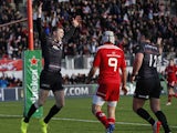 Chris Ashton of Saracens celebrates scoring a try during the European Rugby Champions Cup pool one match between Saracens and Munster at Allianz Park on January 17, 2015