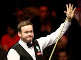 Shaun Murphy of Great Britain celebrates after winning his semi-final match against Mark Allen of Great Britain on day seven of the 2015 Dafabet Masters at Alexandra Palace on January 17, 2015