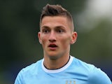 Sinan Bytyqi of Manchester City during the UEFA Youth Champions League match between Manchester City and FC Bayern Muenchen at Ewen Fields on October 2, 2013