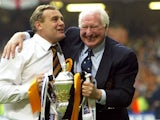 Wolverhampton Wanderers chairman Sir Jack Hayward and manager Dave Jones celebrate with the trophy after the Nationwide Division One Playoff Final match against Sheffield United at Cardiff's Millennium Stadium on May 26, 2003