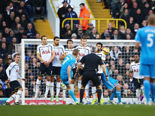 Sebastian Larsson of Sunderland scores from a free kick during the Barclays Premier League match between Tottenham Hotspur and Sunderland at White Hart Lane on January 17, 2015