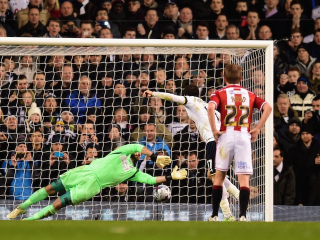 Andros Townsend of Spurs scores the opening goal past Mark Howard of Sheffield United from the penalty spot during the Capital One Cup Semi-Final first leg match on January 21, 2015