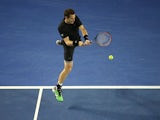 Andy Murray plays a backhand stroke during the fourth-round Australian Open match against Grigor Dimitrov in Melbourne on January 25, 2015