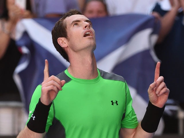 Britain's Andy Murray celebrates after beating Joao Sousa of Portugal in their men's singles match on day five of the 2015 Australian Open tennis tournament in Melbourne on January 23, 2015