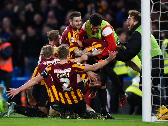 Andrew Halliday of Bradford City is congratulated by teammates after scoring his team's third goal during the FA Cup Fourth Round match between Chelsea and Bradford City at Stamford Bridge on January 24, 2015
