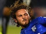 Bradley Dack of Gillingham tackles Mehdi Abeid of Newcastle United during the Capital One Cup second round match on January 24, 2015