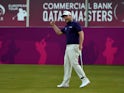 Branden Grace of South Africa celebrates his birdie on the eighteenth green during the final round of the Commercial Bank Qatar Masters at Doha Golf Club on January 24, 2015
