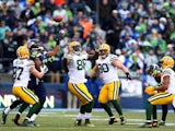 Brandon Bostick #86 of the Green Bay Packers bobbles an onsides kick as Chris Matthews #13 of the Seattle Seahawks on January 18, 2015