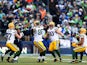 Brandon Bostick #86 of the Green Bay Packers bobbles an onsides kick as Chris Matthews #13 of the Seattle Seahawks on January 18, 2015