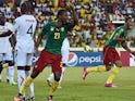 Cameroon's defender Aurelien Chedjou celebrates after scoring a goal during the 2015 African Cup of Nations group D football match between Cameroon and Guinea in Malabo on January 24, 2015