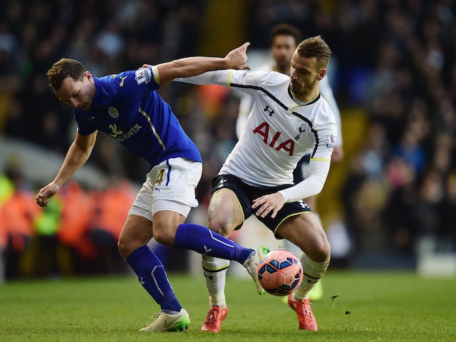 Daniel Drinkwater of Leicester City and Roberto Soldado of Spurs compete for the ball during the FA Cup Fourth Round match on January 24, 2015