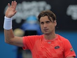 David Ferrer waves to the crowd after his first-round win at the Australian Open on January 20, 2015