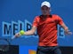 Goffin avoids scare to set up Murray clash