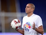 French foward David Trezeguet stands during the inter religious 'match for peace' football game in Rome's Olympic Stadium on September 1, 2014
