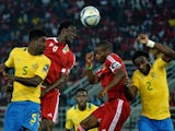 Congo's midfielder Delvin Ndinga (2ndL) heads the ball next to Gabon's defender Bruno Ecuele during the 2015 African Cup of Nations group A football match on January 21, 2015